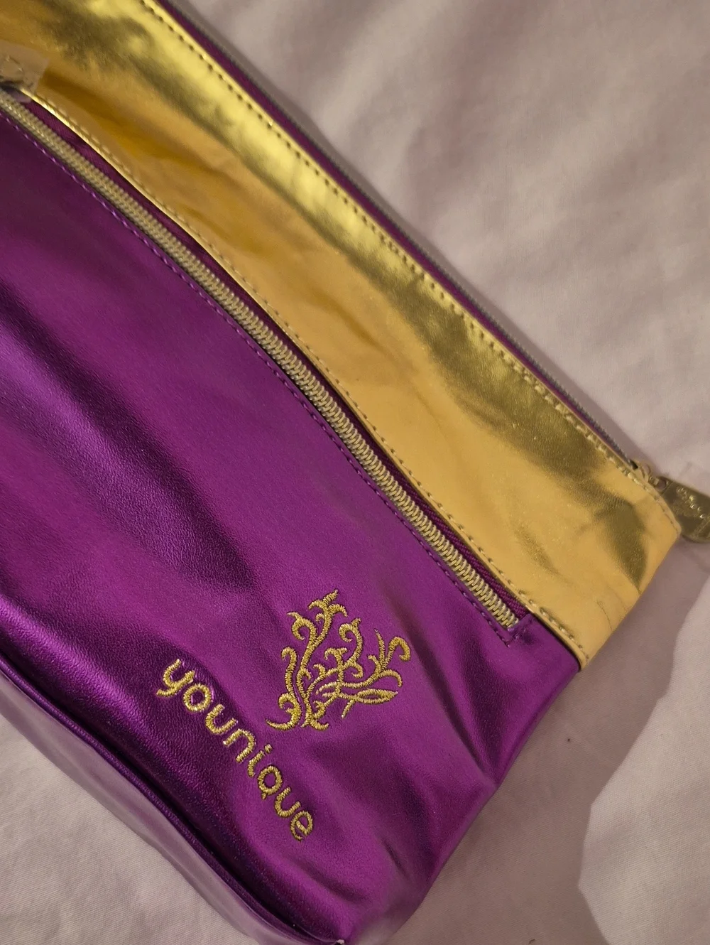 NWOT Younique Purple and Gold Cosmetic Pouch